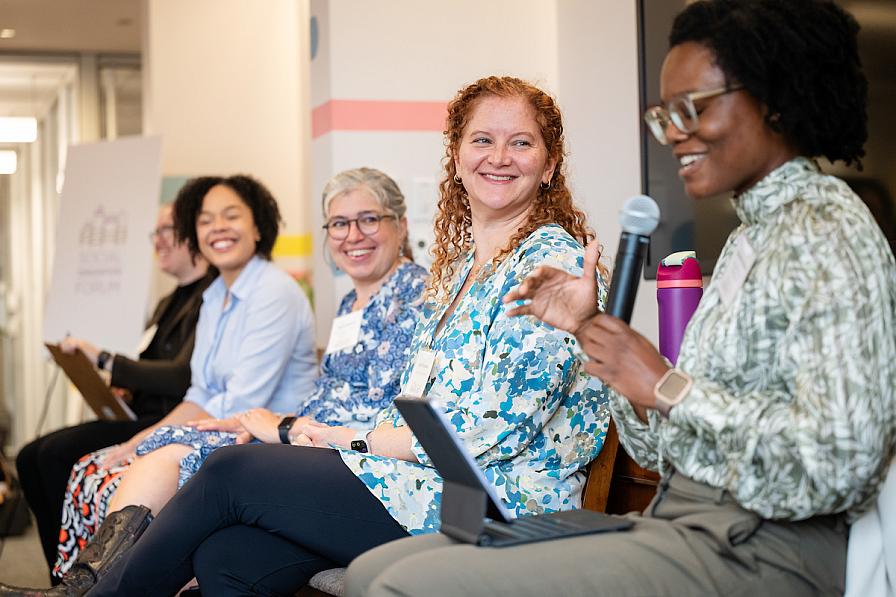 Shavel'le Olivier speaks as part of a panel at SIF's Rooted in Trust Event in September 2024