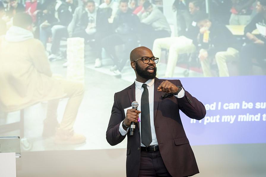 Social Innovator on stage speaking at 2022 Showcase event